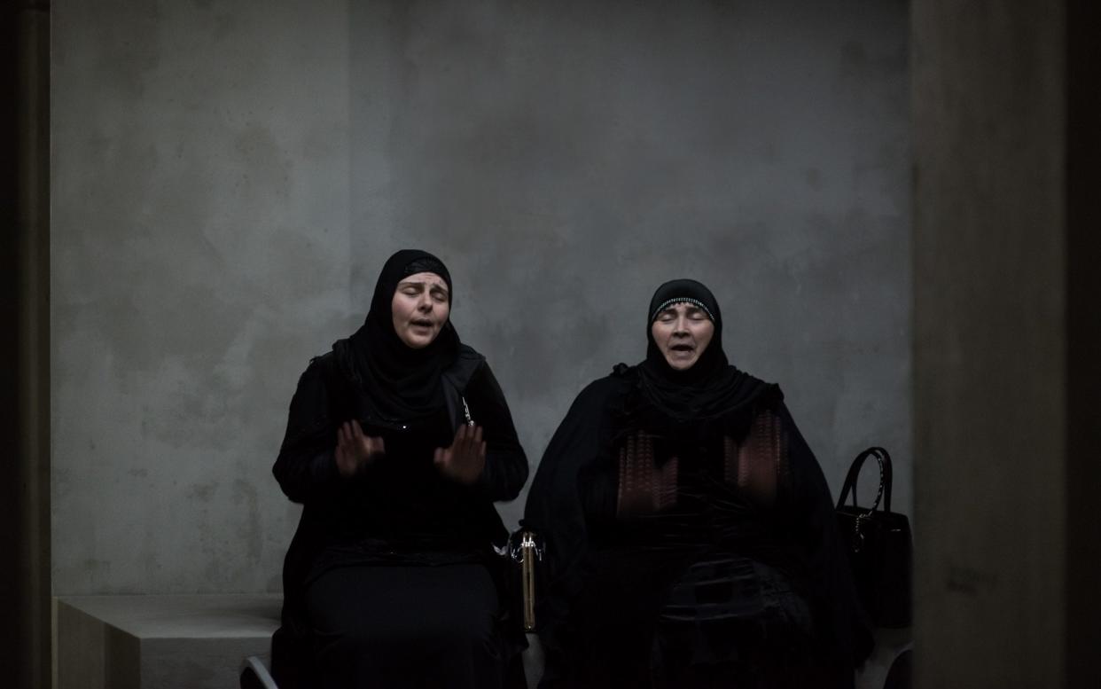 Haji Rahila Jafarova and Lala Ismayilova perform in Taryn Simon's latest artwork, An Occupation of Loss, 2018 - Hugo Glendinning Courtesy Artangel and Taryn Simon Projects