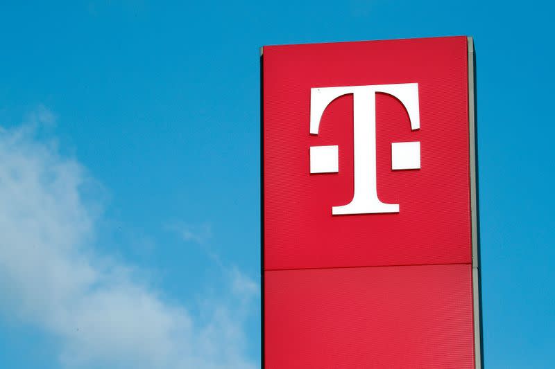 FILE PHOTO: A logo of Germany's telecommunications giant Deutsche Telekom AG is seen before the company's annual news conference in Bonn