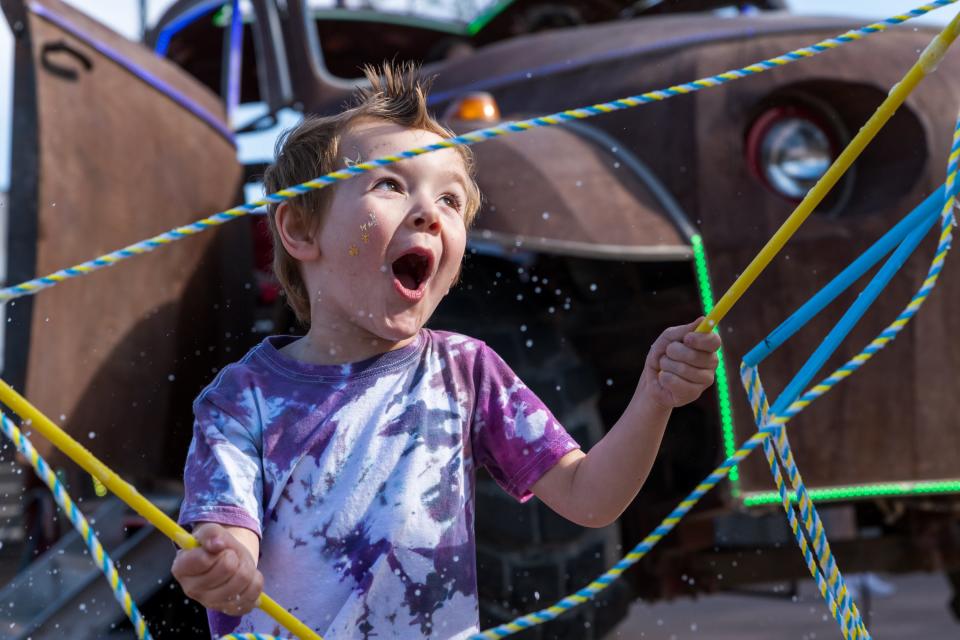 Oliver Hardman, 4, plays with oversized bubble wands at M3F Fest in Margaret T. Hance Park on March 4, 2022, in Phoenix, Ariz.