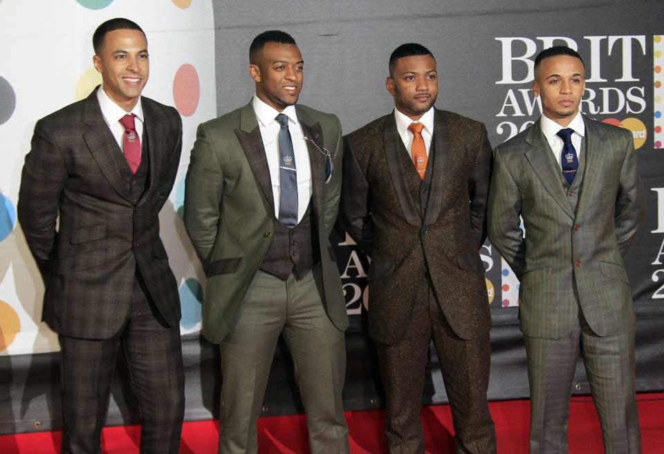 From left, Marvin Humes, Oritse Williams, Jonathan 'JB' Gill and Aston Merrygold of British band JLS seen arriving at the BRIT Awards 2013 at the o2 Arena in London on Wednesday, Feb. 20, 2013. (Photo by Joel Ryan/Invision/AP)