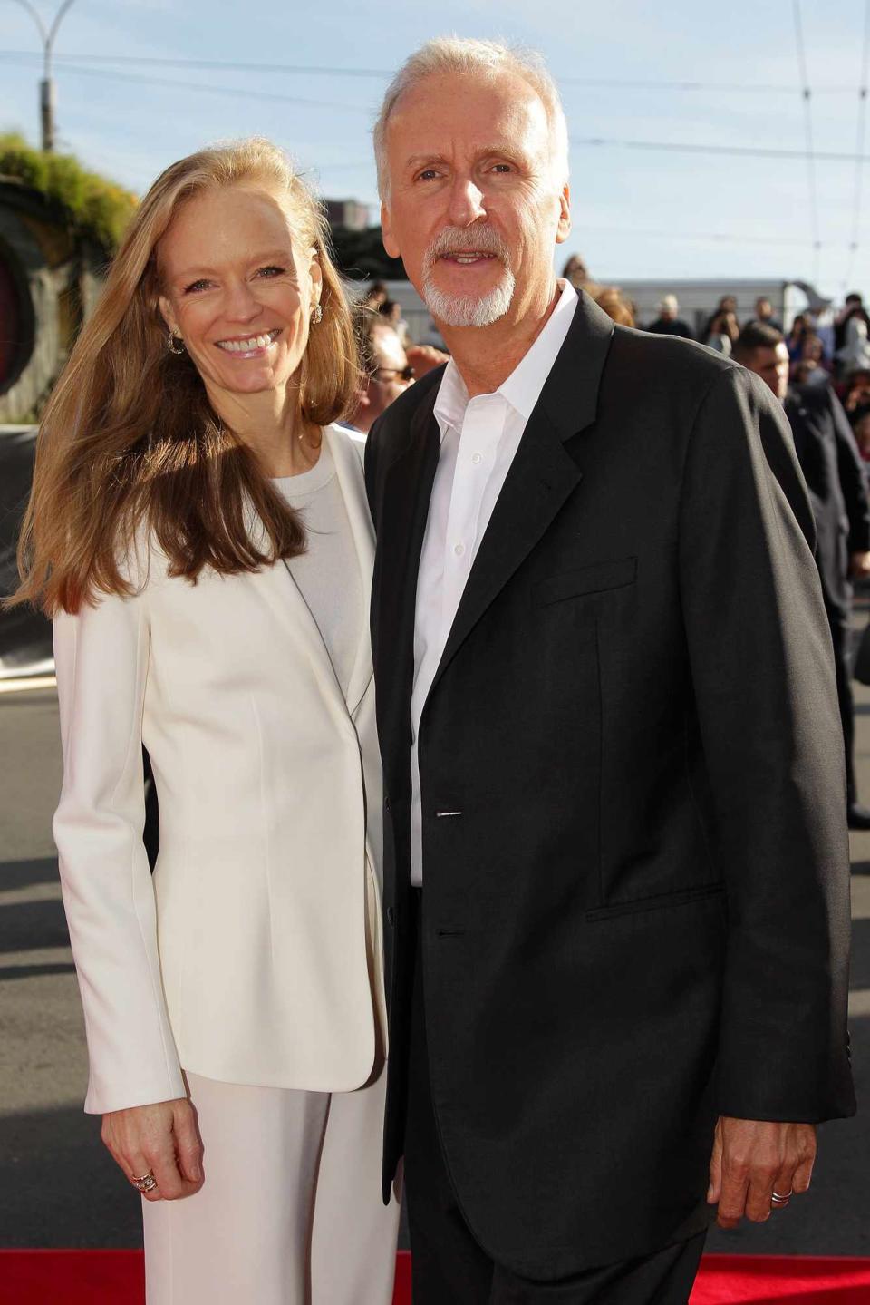 James Cameron and wife Suzy Amis arrive at the "The Hobbit: An Unexpected Journey" World Premiere at Embassy Theatre on November 28, 2012 in Wellington, New Zealand