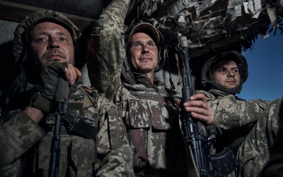 Ukrainian soldiers of the 10th Mountain Assault Brigade prepare to move toward the zero frontline positions