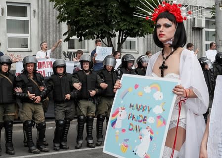 A participant takes part in the Equality March, organized by the LGBT community in Kiev