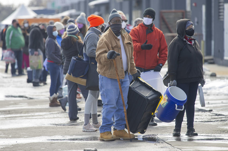 Elmo Houston waiting in line at St. Elmo Brewery for free potable water. Source: AAP