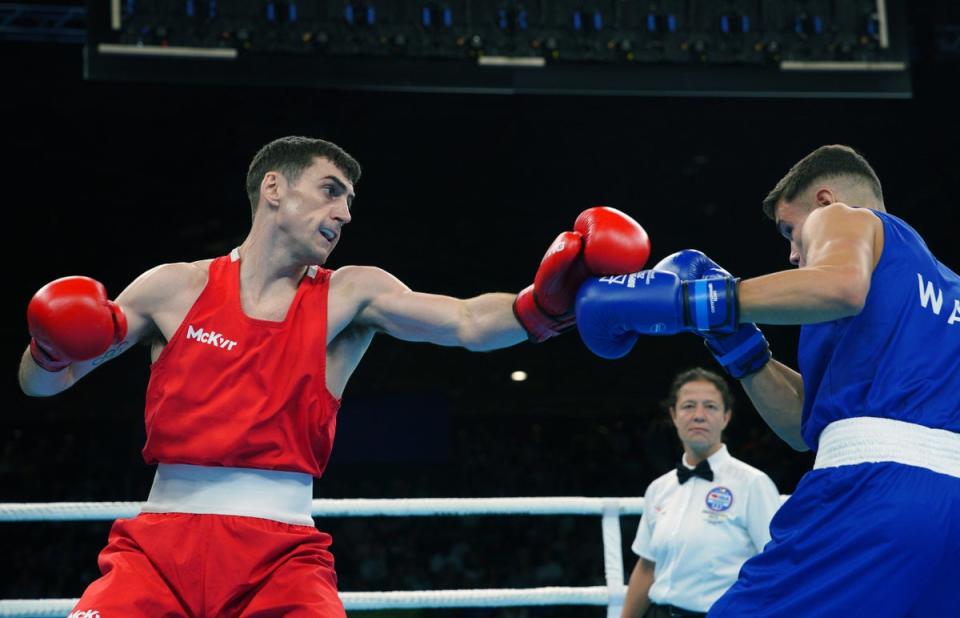 Aidan Walsh, in red, won one of five golds in the ring on Sunday for Northern Ireland (Peter Byrne/PA) (PA Wire)