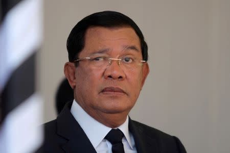 FILE PHOTO: Cambodian Prime Minister Hun Sen attends the funeral of Cambodia's late Deputy Prime Minister Sok An in Phnom Penh, Cambodia, March 19, 2017. REUTERS/Samrang Pring/File Photo