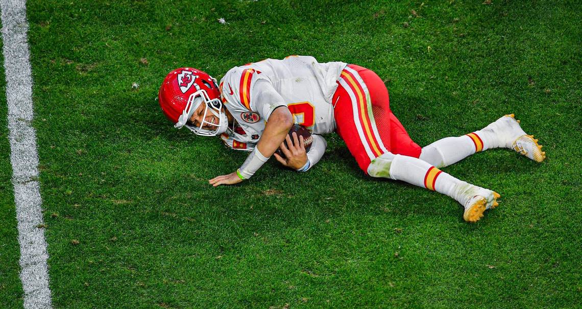 Kansas City Chiefs quarterback Patrick Mahomes grimaces in pain after being tackled late in the second quarter during Super Bowl LVII Sunday, Feb. 12, 2023, in Glendale, Ariz.