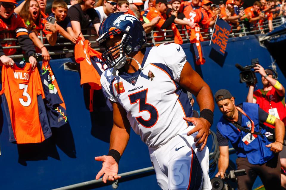 Denver Broncos quarterback Russell Wilson exits the locker room before pregame warmups against the Seattle Seahawks at Lumen Field.