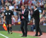 Liverpool manager Brendan Rodgers gives instructions on the touchline