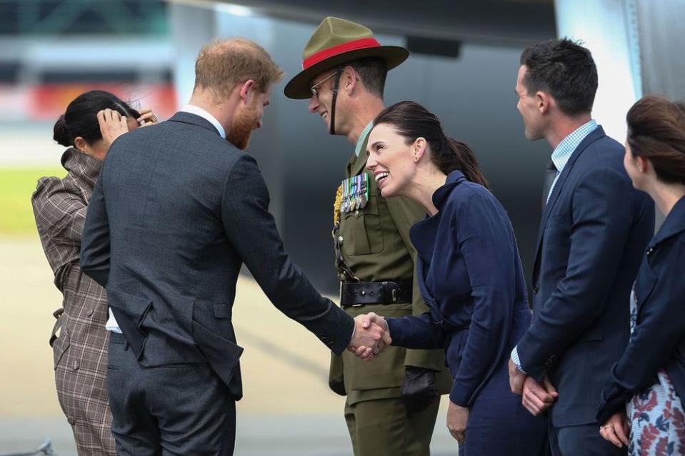 The royal couple greeting New Zealand Prime Minister Jacinda Ardern