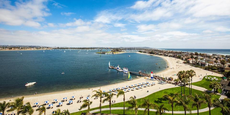 <p><strong>Best Beach for Dogs </strong><br></p><p>Located in Mission Bay, <a href="https://go.redirectingat.com?id=74968X1596630&url=https%3A%2F%2Fwww.tripadvisor.com%2FAttraction_Review-g60750-d3531365-Reviews-Fiesta_Island-San_Diego_California.html&sref=https%3A%2F%2Fwww.redbookmag.com%2Flife%2Fg37132327%2Ftop-california-beach-vacations%2F" rel="nofollow noopener" target="_blank" data-ylk="slk:Fiesta Island;elm:context_link;itc:0;sec:content-canvas" class="link ">Fiesta Island</a> is just 15 minutes from downtown San Diego. The entirety of the island is a park, and much of it is leash-free for dogs. Your four-legged friends will love this large crescent-shaped beach, where they can run on the sand and small dunes, and cool off with a dip in the shallow bay waters. </p><p><strong><em>Where to Stay:</em></strong> <a href="https://go.redirectingat.com?id=74968X1596630&url=https%3A%2F%2Fwww.tripadvisor.com%2FHotel_Review-g60750-d1237001-Reviews-Hotel_Indigo_San_Diego_Gaslamp_Quarter-San_Diego_California.html&sref=https%3A%2F%2Fwww.redbookmag.com%2Flife%2Fg37132327%2Ftop-california-beach-vacations%2F" rel="nofollow noopener" target="_blank" data-ylk="slk:Hotel Indigo San Diego Gaslamp Quarter;elm:context_link;itc:0;sec:content-canvas" class="link ">Hotel Indigo San Diego Gaslamp Quarter</a>, <a href="https://go.redirectingat.com?id=74968X1596630&url=https%3A%2F%2Fwww.tripadvisor.com%2FHotel_Review-g60750-d628619-Reviews-The_Sofia_Hotel-San_Diego_California.html&sref=https%3A%2F%2Fwww.redbookmag.com%2Flife%2Fg37132327%2Ftop-california-beach-vacations%2F" rel="nofollow noopener" target="_blank" data-ylk="slk:The Sofia Hotel;elm:context_link;itc:0;sec:content-canvas" class="link ">The Sofia Hotel</a></p>