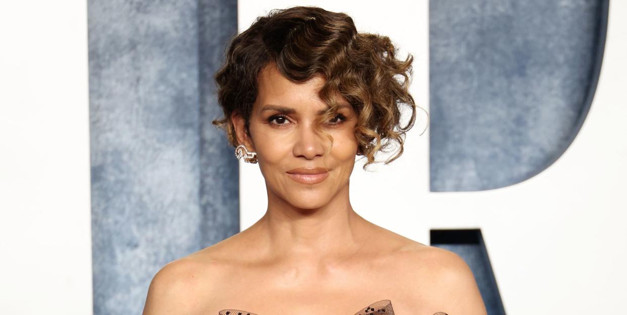 halle berry wears black sheer mini dress to the 2023 vanity fair oscar party hosted by radhika jones arrivals