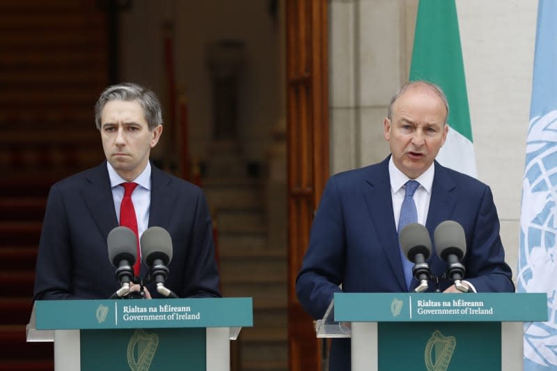 Irish prime minister Simon Harris (L) and Tanaiste Micheal Martin speak to the media during a press conference outside the Government Buildings, as the Republic of Ireland recognised the state of Palestine. Damien Storan/PA Wire/dpa
