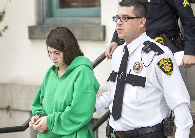 In this December 20, 2013 file photo, Miranda Barbour is led out of the courthouse after her preliminary hearing in Sunbury, Pennsylvania. Photo: AP.