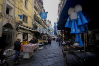 Banners and writings in support of Napoli soccer team are displayed in downtown Naples, Italy, Wednesday, April 19, 2023. It's a celebration more than 30 years in the making, and historically superstitious Napoli fans are already painting the city blue in anticipation of the team's first Italian league title since the days when Diego Maradona played for the club. (AP Photo/Andrew Medichini)