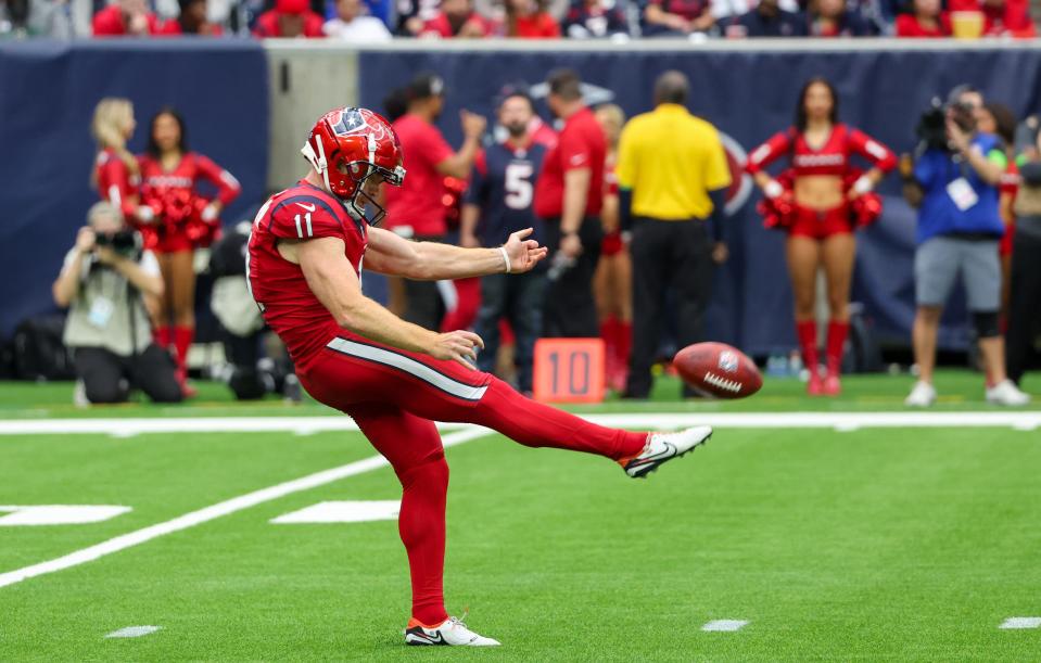 Nov 26, 2023; Houston, Texas, USA; Houston Texans punter Cameron Johnston (11) punts against the Jacksonville Jaguars at NRG Stadium. Mandatory Credit: Thomas Shea-USA TODAY Sports