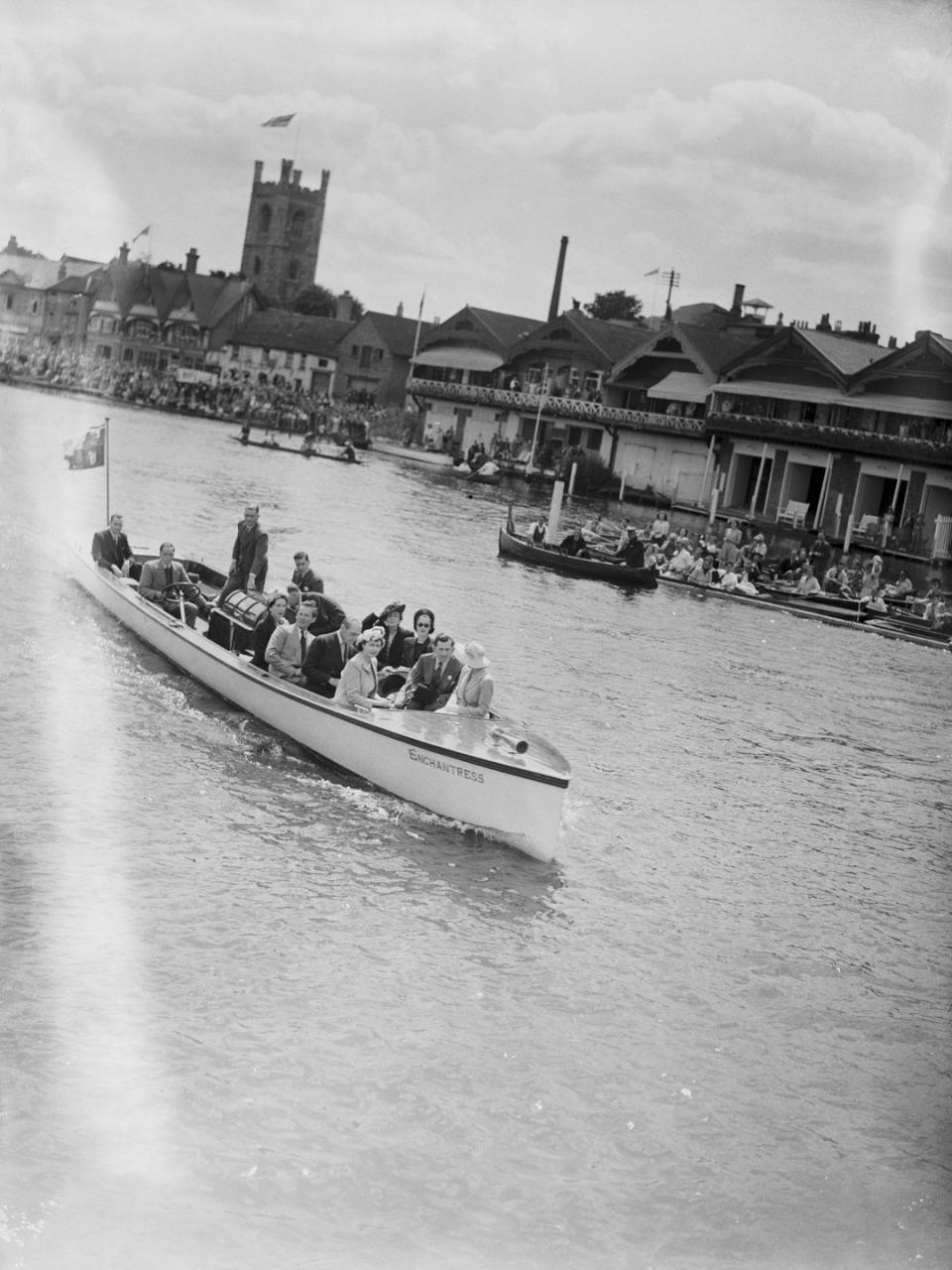<p>Princess Elizabeth and Princess Margaret sail on the Royal Launch during the celebrated regatta at Oxfordshire — a British tradition since 1839. </p>