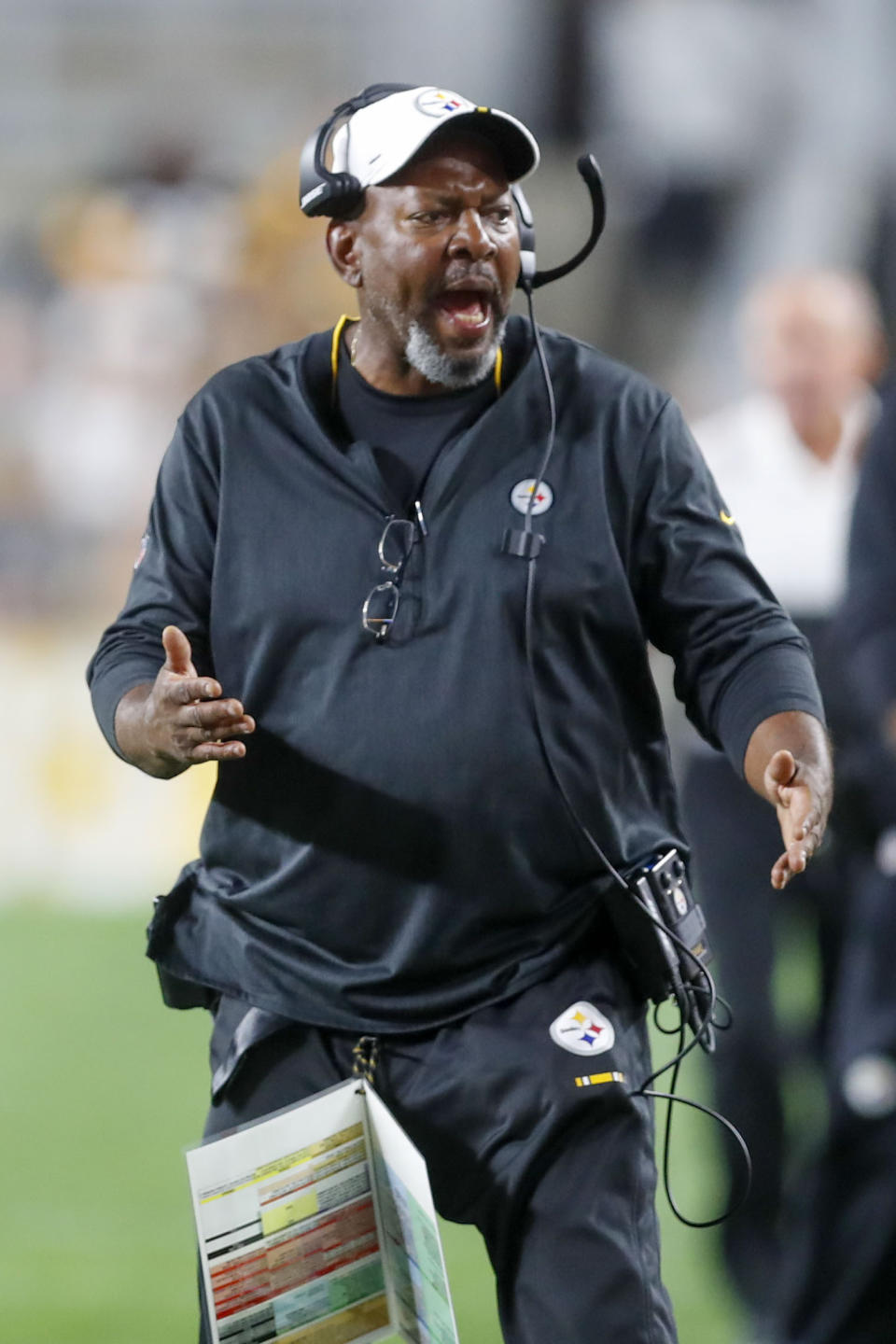 In this photo from Friday, Aug. 9, 2019, Pittsburgh Steelers wide receivers coach Darryl Drake talks to a receiver during the second half of an NFL preseason football game against the Tampa Bay Buccaneers in Pittsburgh. The team said Drake, who joined the coaching staff in 2018, died early Sunday morning, Aug. 12, 2019. (AP Photo/Keith Srakocic)