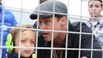 Brad Pitt spent some one-on-one time with his 7-year-old son Knox at the MotoGP British Grand Prix Race at Silverstone in England on Sunday. The father-of-six was super attentive to his lookalike son as they got the VIP treatment at the races. Pitt was seen with his trademark newsboy hat while Knox donned some bright yellow headphones to shield his ears from the noise of the race. <strong> WATCH: Brad Pitt -- 'I Don't Suck at Being a Dad' </strong> Pitt's appearance at the event came just days ahead of the release of the documentary <em> Hitting the Apex</em>, which the 51-year-old actor narrated. The father-son duo was accompanied by the film's director, Mark Neale. Pitt even spoke at the Grand Prix and shared his excitement over the upcoming documentary. <strong> MORE: Brad Pitt Shows Off Tattoo Honoring His Kids </strong> "Well, first of all I want to say great to be here at Silverstone and we're here for Mark Neal's film and he's made a great one, another great one. It's exhilarating. It's really moving," he said. "It's got a universal mythological tale to it and we're really proud to get it out there. I'm telling you, the hardcore fans are going to love it. The newcomers to the sport are going to love it and we're really proud." <strong> WATCH: Angelina Jolie Pitt and Her Son Maddox Team Up to Direct Cambodia Film for Netflix </strong> Continuing to gush over the director, Angelina Jolie's husband added, "Mark's been on this for several years as a documentarian, but, for me, it was a great excuse to get in the editing room with him and work with him and amazing footage." Getty Images Pitt is definitely one of the ultimate family men in Hollywood. This past year, ET asked the A-list actor how he was liking married life, of which he replied simply, "It doesn't suck." <strong> WATCH: Brad Pitt's 'Hairvolution' -- A History of His Best and Worst Hairstyles </strong> Check out Brangelina's recent fast-food run: