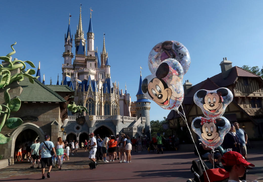 ORLANDO, FL - MAY 31: Mickey Mouse and Minnie Mouse ballons fly in front of Cinderella's Castle at the Magic Kingdom Park at Walt Disney World on May 31, 2024, in Orlando, Florida. (Photo by Gary Hershorn/Getty Images)