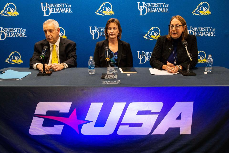 From left, UD President Dennis Assanis, C-USA Commissioner Judy MacLeod and UD athletic director Chrissi Rawak give a press conference at UD's Whitney Athletic Center in Newark, Wednesday, Nov. 29, 2023. The University of Delaware formally announced at the press conference that it has accepted an invitation to join Conference USA as a full-league member effective July 1, 2025.