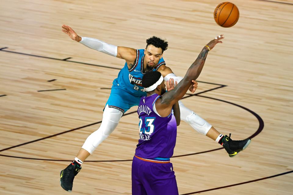 Dillon Brooks and Royce O'Neale during a Memphis Grizzlies versus Utah Jazz basketball game in Orlando, Florida, August 5, 2020.