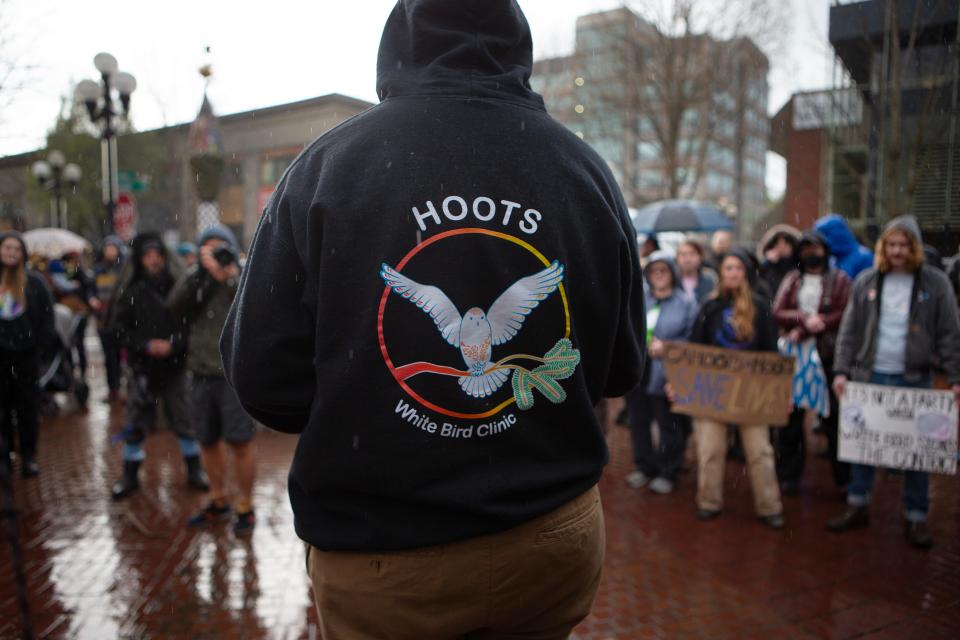 CAHOOTS and HOOTS workers rally in support of their union in downtown Eugene Friday, April 5, 2024.