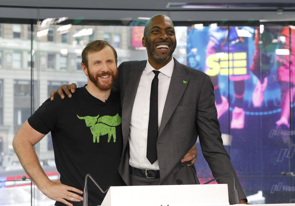 Ethan Brown, left, CEO of Beyond Meat, attends the Opening Bell ceremony with former NBA basketball player John Salley to celebrate the company's IPO at Nasdaq, Thursday, May 2, 2019 in New York. California-based Beyond Meat makes burgers and sausages out of pea protein and other ingredients. Salley is a professed vegan. (AP Photo/Mark Lennihan).