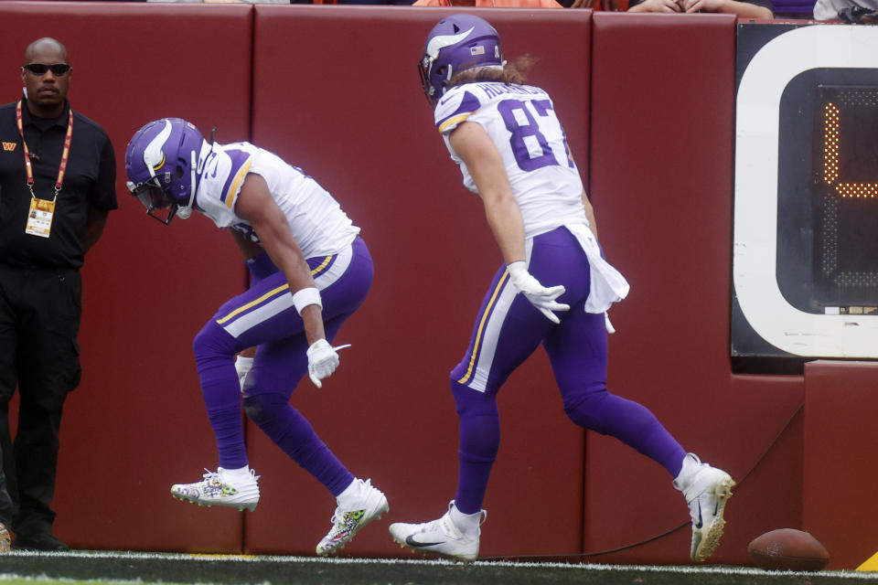Minnesota Vikings wide receiver Justin Jefferson (18) celebrates his touchdown during the first half of a NFL football game between the Washington Commanders and the Minnesota Vikings on Sunday, Nov. 6, 2022 in Landover, Md. (Shaban Athuman/Richmond Times-Dispatch via AP)