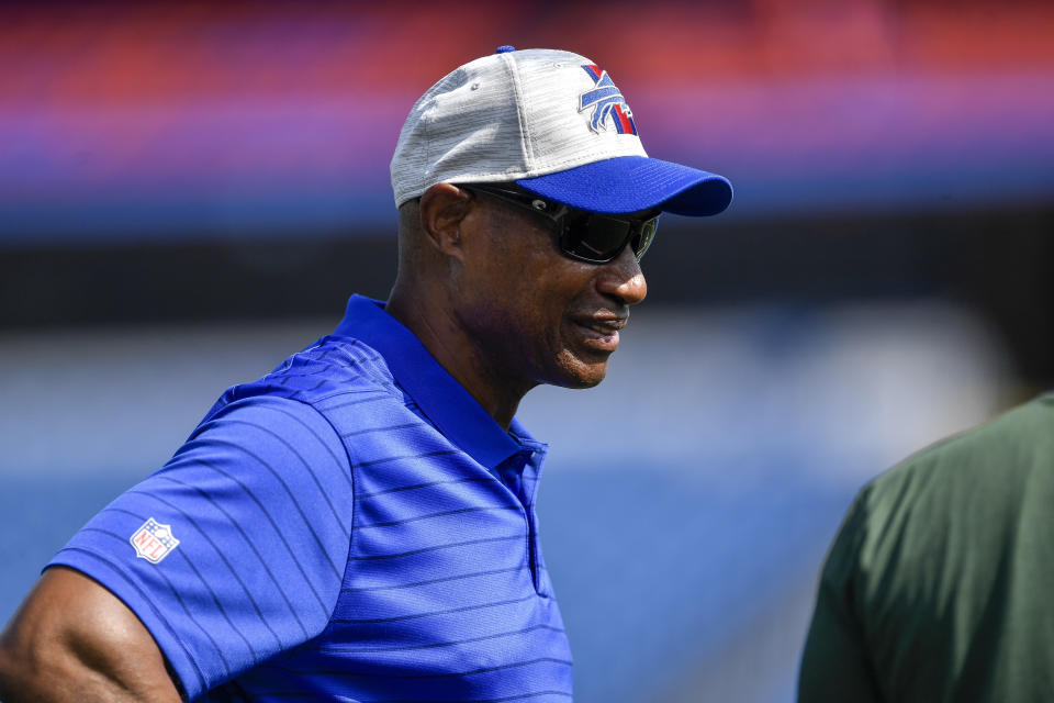 FILE - Buffalo Bills defensive coordinator Leslie Frazier is shown on the field before a preseason NFL football game against the Green Bay Packers in Orchard Park, N.Y., in this Saturday, Aug. 28, 2021, file photo. Washington Football Team's game at the Buffalo Bills on Sunday, Sept. 26 will feature a reunion of coaching colleagues. Washington coach Ron Rivera, Bills coach Sean McDermott and defensive coordinator Leslie Frazier all worked on Andy Reid's first staff with the Philadelphia Eagles in 1999.(AP Photo/Adrian Kraus, File)