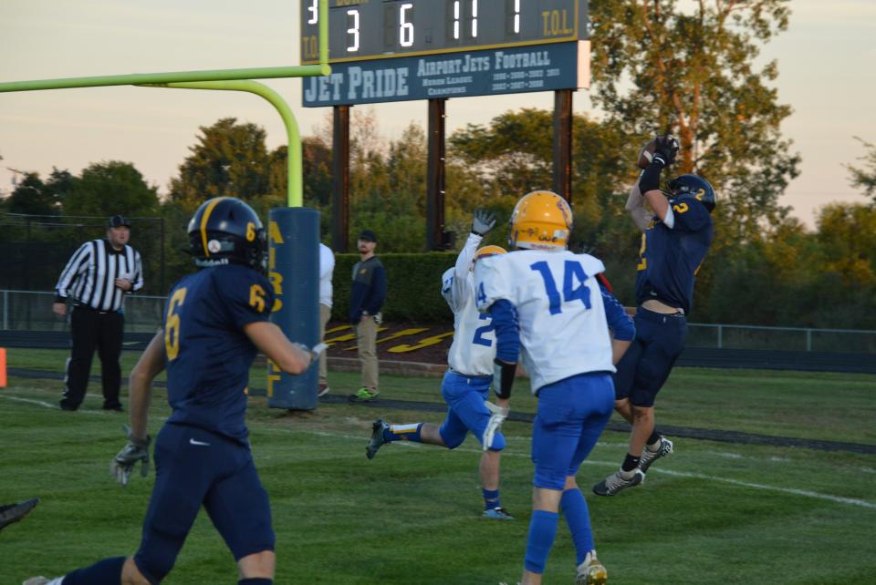 Brett Moore catches a touchdown pass for Airport during a 51-14 victory over Jefferson Friday night.