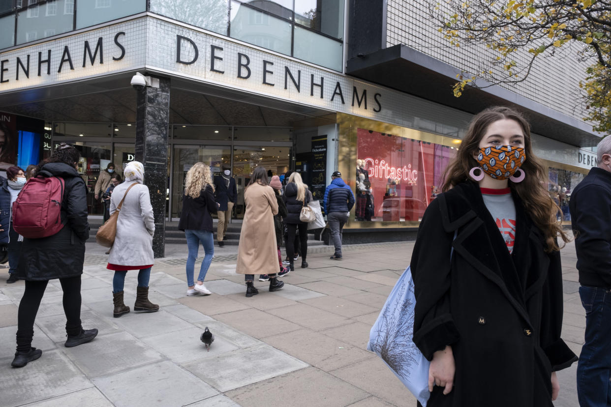 Shoppers queue outside Debenhams on Oxford Street after the department store chain announced it would be closing down for good. Photo: Mike Kemp/In Pictures via Getty