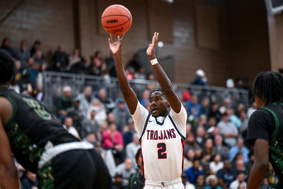 East Lansing's KJ Torbert makes a free throw against Ann Arbor Huron during the third quarter on Tuesday, March 12, 2024, at Holt High School.