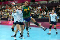 LONDON, ENGLAND - AUGUST 01: Daniela Piedade of Brazil attempts to throw a goal in the Women's Handball Preliminaries Group A match between Great Britain and Brazil on Day 5 of the London 2012 Olympic Games at The Copper Box on August 1, 2012 in London, England. (Photo by Jeff Gross/Getty Images)