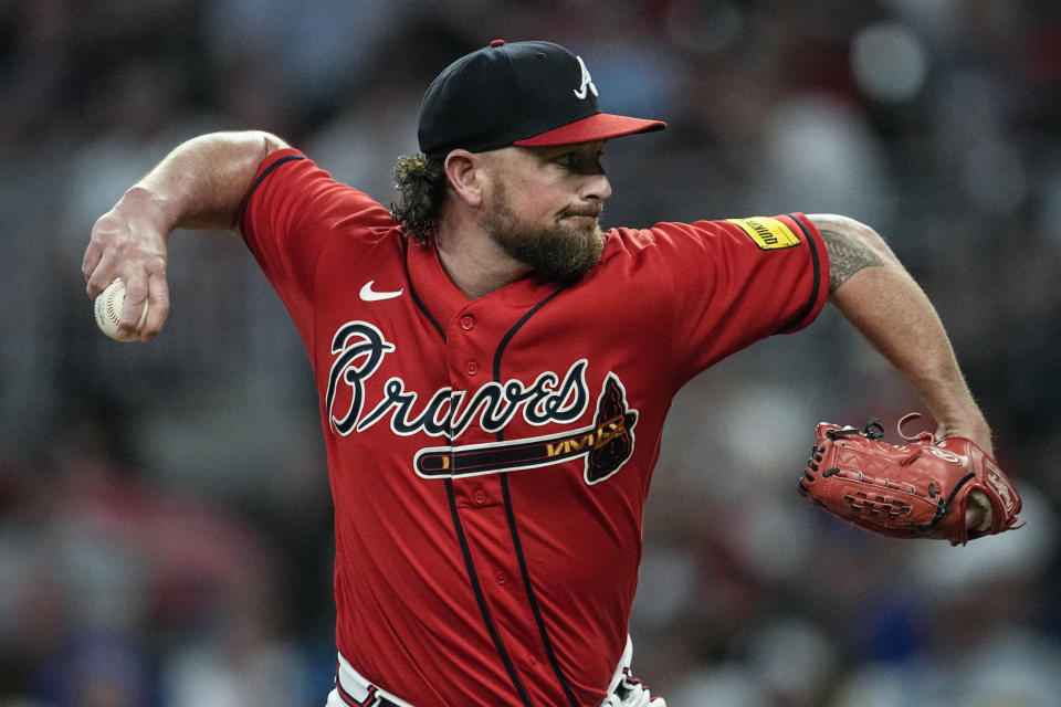 Atlanta Braves relief pitcher Kirby Yates works against the Colorado Rockies in the eighth inning of a baseball game, Friday, June 16, 2023, in Atlanta. (AP Photo/John Bazemore)