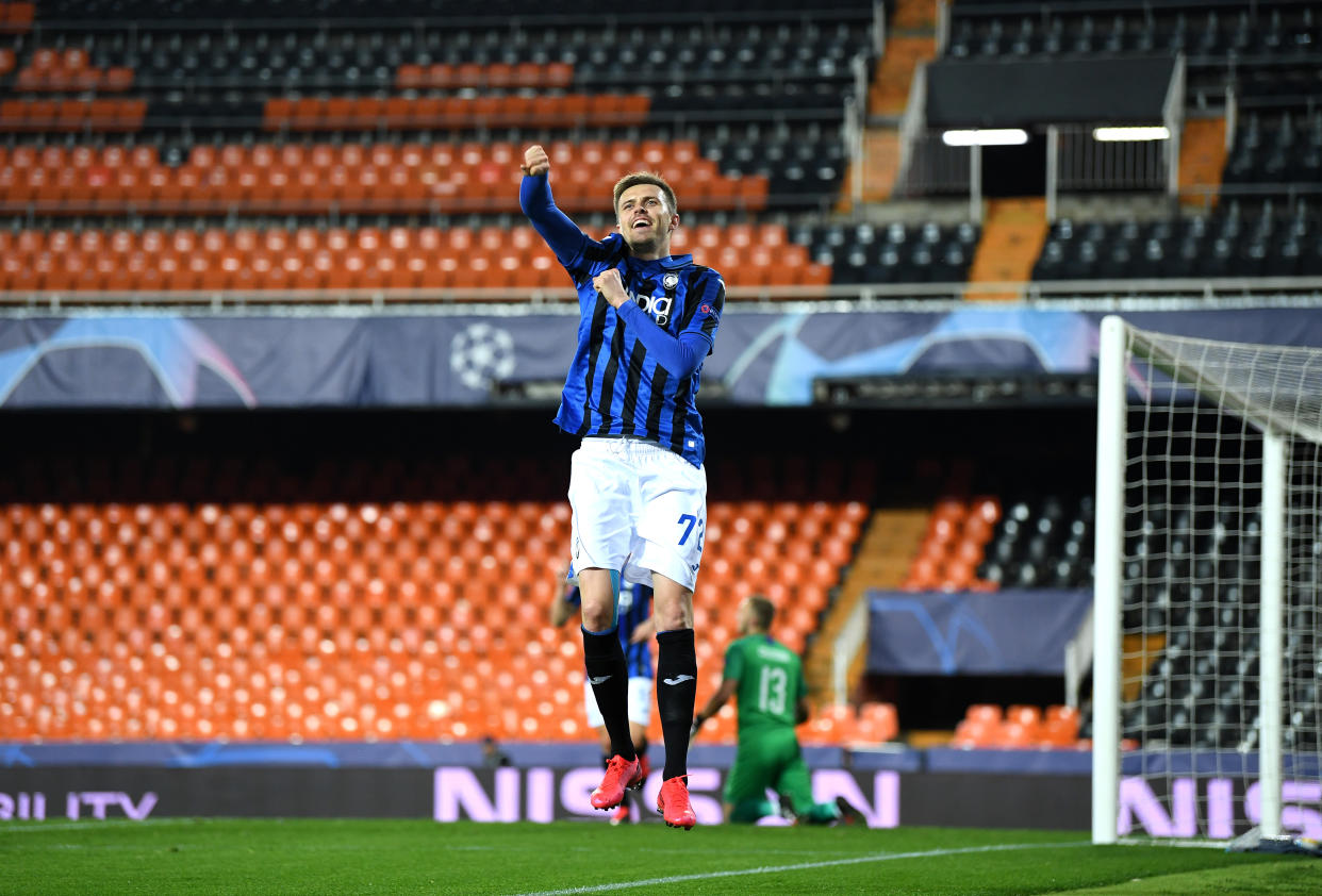 Atalanta's Josip Iličić celebrates after scoring his fourth goal in an empty Mestalla Stadium in the Champions League. (Photo by UEFA Pool/Getty Images)