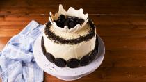 <p>Take your love of Oreos to new heights with this insane chocolate cake. Layered with Oreo crumbs and a marshmallow frosting, it's the biggest form of an Oreo yet. An easy balloon trick creates a bowl of melted white chocolate that will look like a giant splash of milk on top of your cake!</p><p>Get the <strong><a href="https://www.delish.com/cooking/recipe-ideas/a30715282/milk-and-oreos-cake-recipe/" rel="nofollow noopener" target="_blank" data-ylk="slk:Milk & Oreos Cake recipe;elm:context_link;itc:0;sec:content-canvas" class="link ">Milk & Oreos Cake recipe</a></strong>.</p>