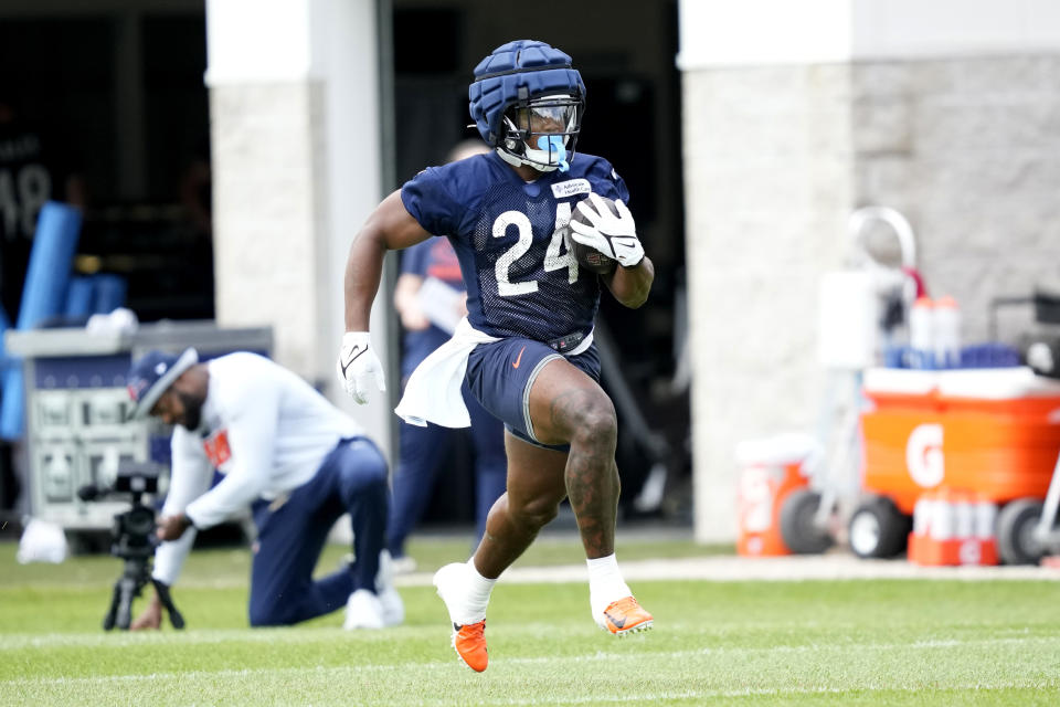 Chicago Bears running back Khalil Herbert participates in the NFL football team’s Back Together training camp event for fans on Saturday, July 29, 2023, in Lake Forest , Ill. (AP Photo/Charles Rex Arbogast) ORG XMIT: ILCA