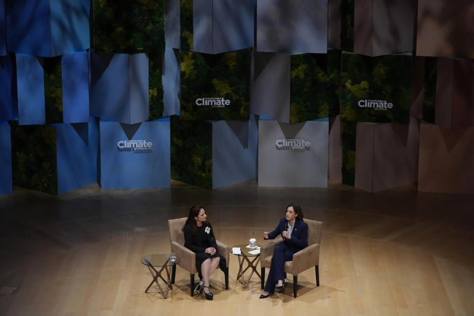 Vice President Kamala Harris, right, speaks with singer Gloria Estefan at the Aspen Ideas: Climate conference, Wednesday, March 8, 2023, in Miami Beach, Fla. The conference is co-hosted by the Aspen Institute and the City of Miami Beach. (AP Photo/Rebecca Blackwell)