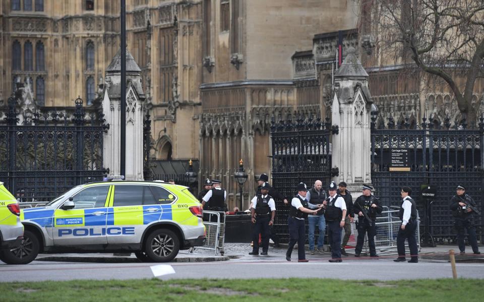 Police outside Palace of Westminster - Credit: Victoria Jones /PA