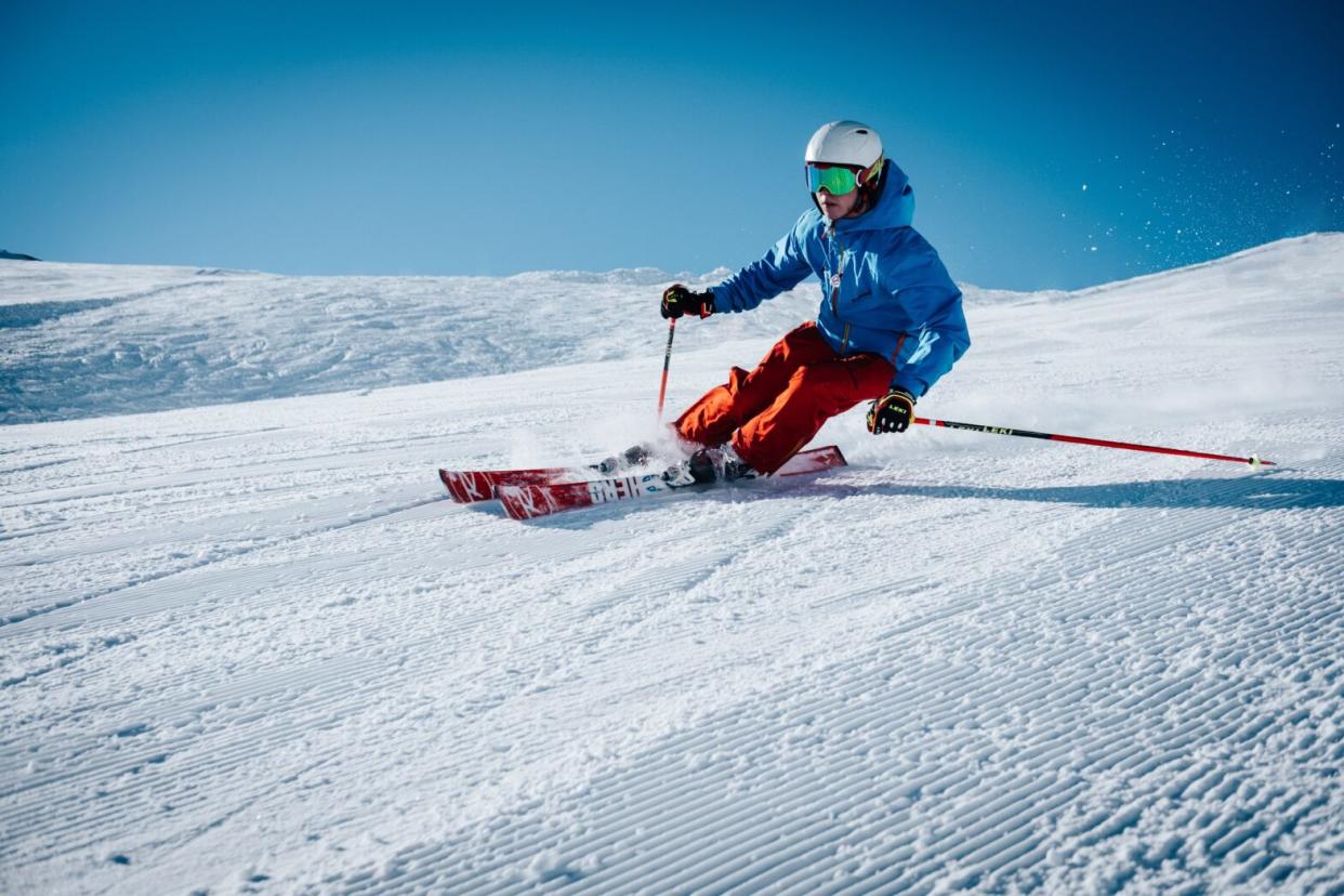 Black Man skiing on slopes