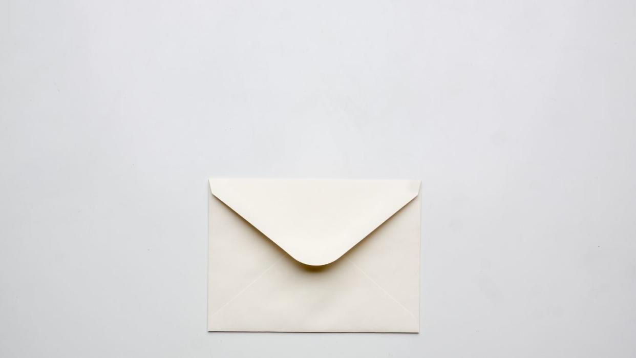 empty envelope isolated on a white table