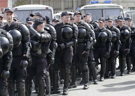 Interior Ministry officers gather to maintain order ahead of an opposition protest, calling for Russian President Vladimir Putin not to run for another presidential term next year, in central Moscow, Russia, April 29, 2017. REUTERS/Tatyana Makeyeva