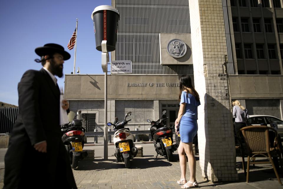 An ultra-Orthodox Jewish man walks by the U.S. Embassy in Tel Aviv, Israel January 20, 2017. (Photo: Amir Cohen/Reuters)