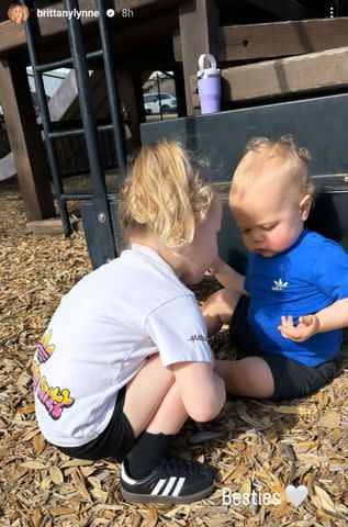 <p>Instagram/brittanylynne</p> Sterling and Bronze Mahomes play on a playground together.