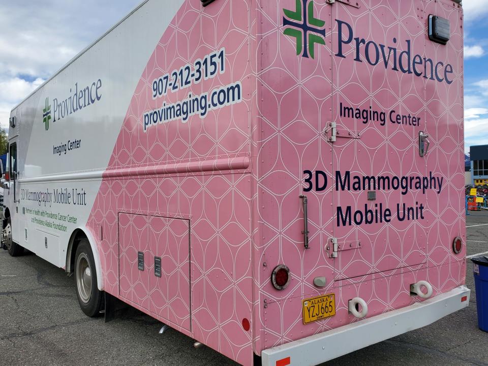 The Providence Imaging Center's mobile mammography unit is parked at Anchorage's Bartlett High School on May 18, 2024, at the starting area for the Gold Nugget Triathlon. (Photo by Yereth Rosen/Alaska Beacon)