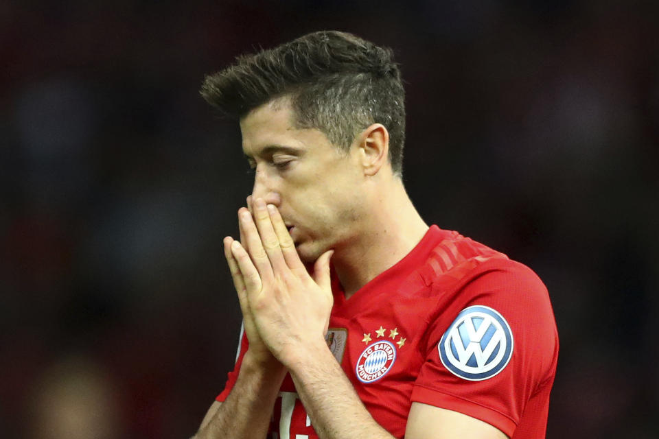 Bayern's Robert Lewandowski reacts during the German soccer cup, DFB Pokal, final match between RB Leipzig and Bayern Munich at the Olympic stadium in Berlin, Germany, Saturday, May 25, 2019. (AP Photo/Matthias Schrader)