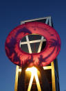 <p>A demonstrator holds up a life preserver during a protest against Bankia at corporate headquarters in Madrid, June 16, 2012. (AP Photo/Andres Kudacki) </p>