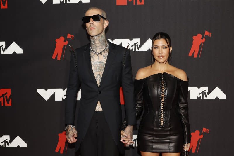 Travis Barker (L) and Kourtney Kardashian arrive on the red carpet at the 38th annual MTV Video Music Awards at Barclays Center in New York City in 2021. File Photo by John Angelillo/UPI