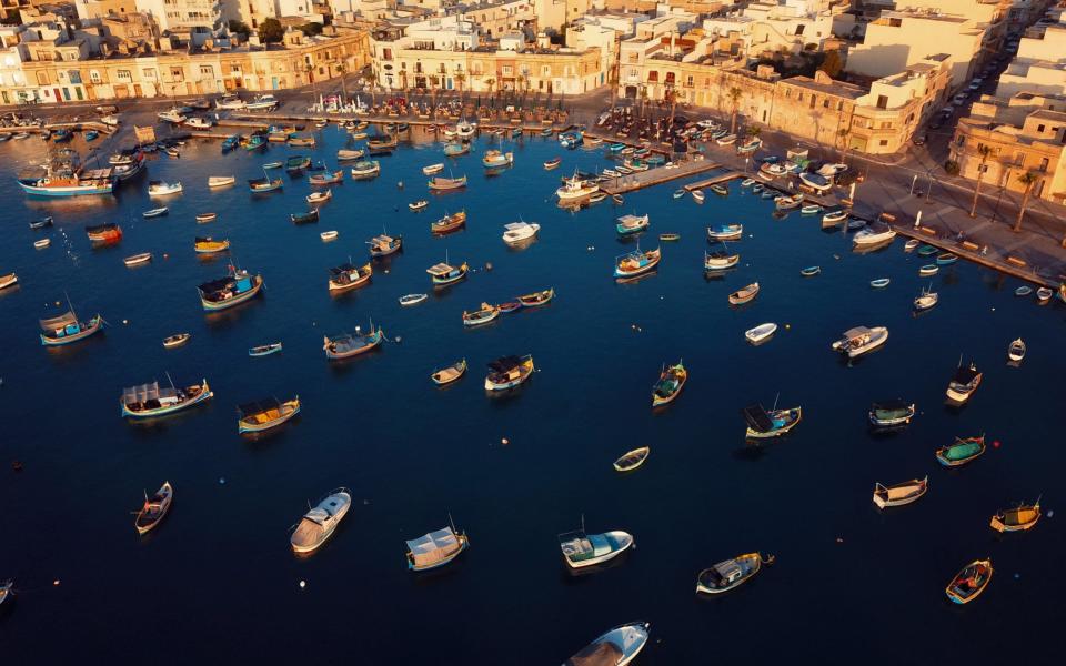 High angle view of the boats at Marsaxlokk harbour in Malta - Felix Cesare/Moment RF